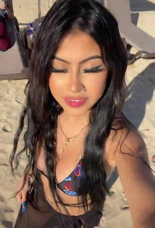 Titillating Desiree Montoya in Bikini Top at the Beach