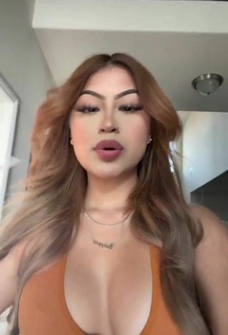 Sweet Desiree Montoya Shows Cleavage in Cute Orange Crop Top