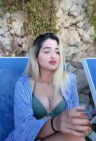 5. Titillating Eda Aslankoç Shows Cleavage in Olive Bikini Top