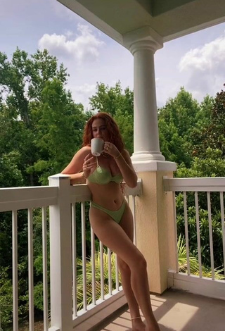 Cute Faith Collins in Green Bikini on the Balcony