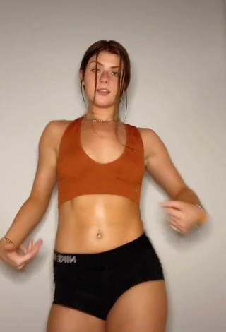 4. Sultry Faith Ordway in Orange Crop Top