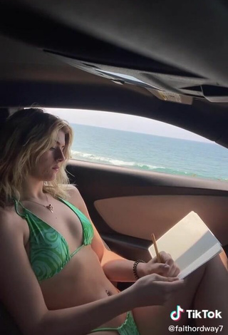 5. Titillating Faith Ordway in Green Bikini in a Car