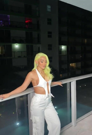 Sweetie Farina Shows Cleavage in White Crop Top on the Balcony (Side Boob)