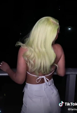 5. Sweetie Farina Shows Cleavage in White Crop Top on the Balcony (Side Boob)