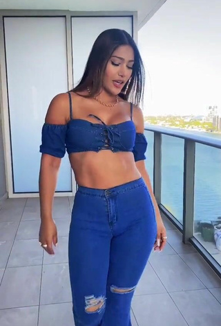 2. Sultry Farina in Blue Crop Top on the Balcony