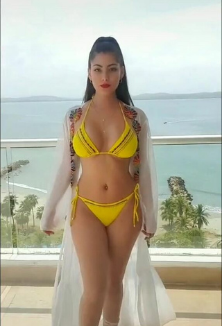 Franjomar in Inviting Yellow Bikini on the Balcony