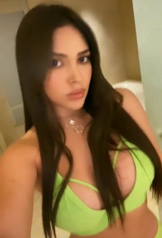 5. Cute Franjomar Shows Cleavage in Green Crop Top