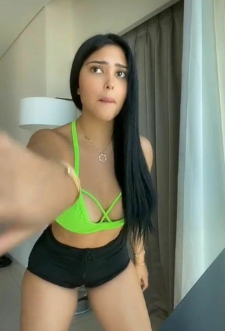 2. Sweetie Franjomar Shows Cleavage in Green Crop Top