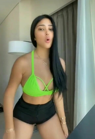 3. Sweetie Franjomar Shows Cleavage in Green Crop Top