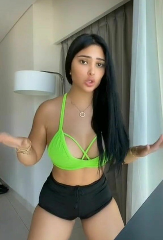 4. Sweetie Franjomar Shows Cleavage in Green Crop Top