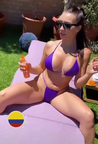 Sexy Franjomar Shows Cleavage in Violet Bikini