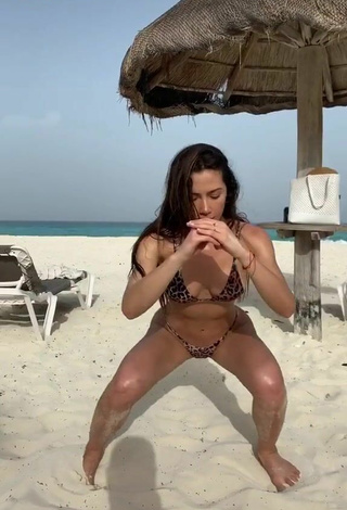 4. Georgina Mazzeo Looks Breathtaking in Leopard Bikini at the Beach while doing Fitness Exercises