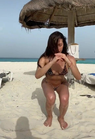 5. Georgina Mazzeo Looks Breathtaking in Leopard Bikini at the Beach while doing Fitness Exercises