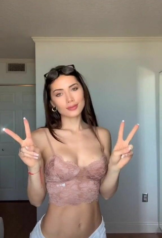 Titillating Georgina Mazzeo Shows Cleavage in Beige Crop Top