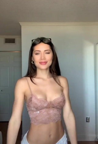 2. Titillating Georgina Mazzeo Shows Cleavage in Beige Crop Top