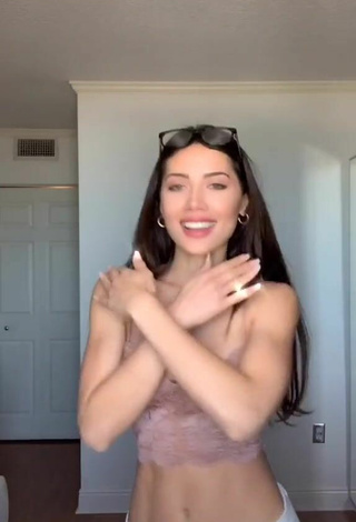 4. Titillating Georgina Mazzeo Shows Cleavage in Beige Crop Top