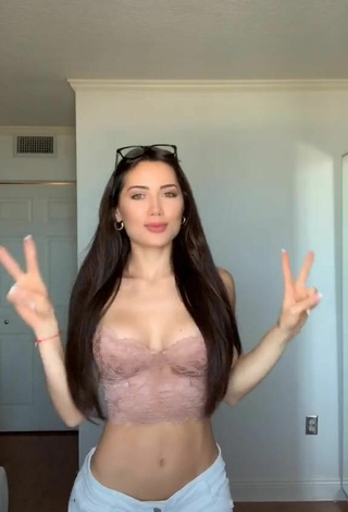 Luscious Georgina Mazzeo Shows Cleavage in Beige Crop Top