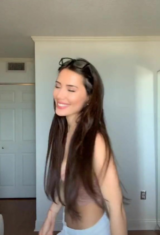 3. Luscious Georgina Mazzeo Shows Cleavage in Beige Crop Top