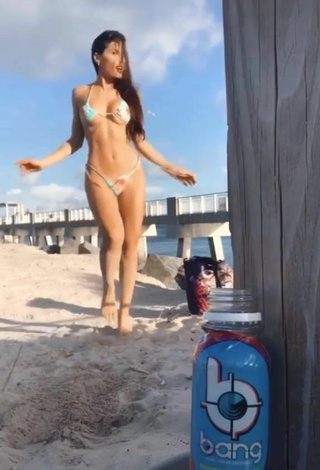 4. Cute Georgina Mazzeo Shows Cleavage in Bikini at the Beach (Underboob)