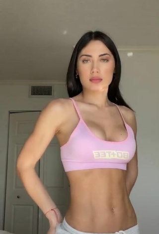 Seductive Georgina Mazzeo Shows Cleavage in Pink Crop Top