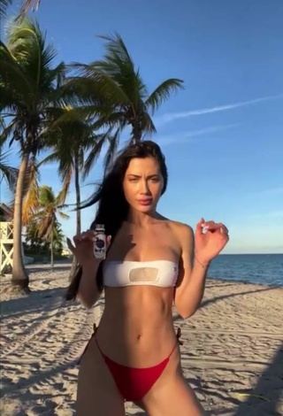 4. Alluring Georgina Mazzeo Shows Cleavage in Erotic Bikini at the Beach