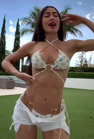 4. Hottie Georgina Mazzeo Shows Cleavage in Bikini Top