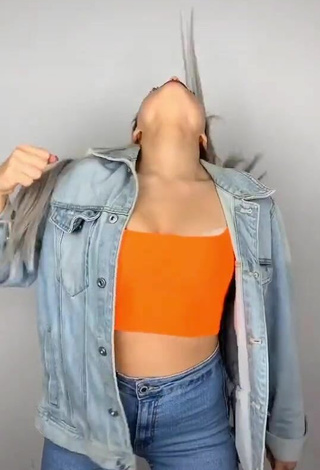 2. Sultry Vanessa in Orange Crop Top