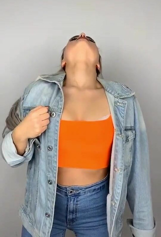 3. Sultry Vanessa in Orange Crop Top