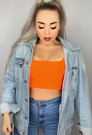 4. Sultry Vanessa in Orange Crop Top