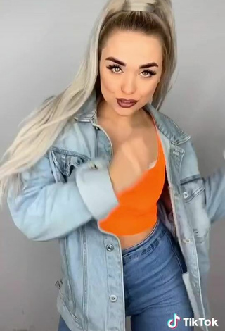 5. Sultry Vanessa in Orange Crop Top