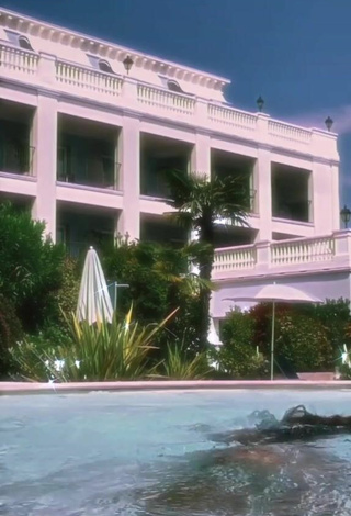 Luscious Iris Ferrari in White Bikini at the Pool