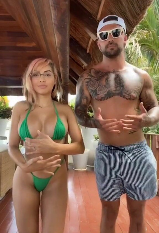 4. Sultry Maddy Belle Shows Cleavage in Green Mini Bikini