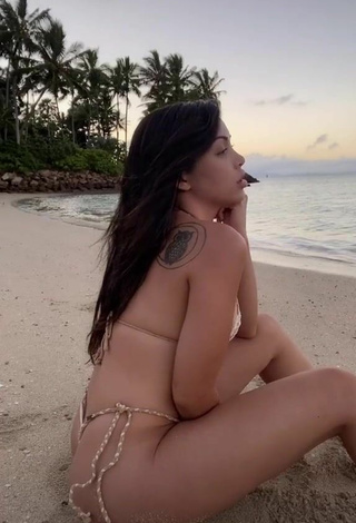 Sultry Maddy Belle in Thong at the Beach