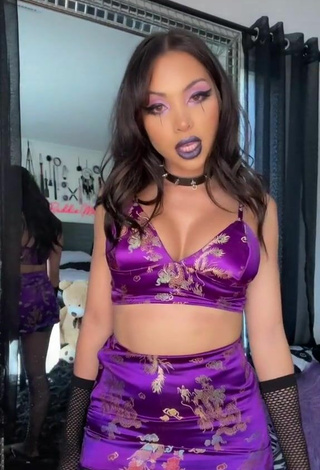 3. Amazing Maddy Belle Shows Cleavage in Hot Violet Crop Top