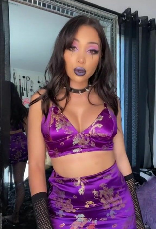 5. Amazing Maddy Belle Shows Cleavage in Hot Violet Crop Top