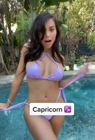 2. Adorable Maddy Belle Shows Cleavage in Seductive Purple Bikini at the Pool (Side Boob)