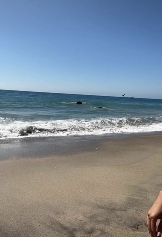 Pretty Maddy Belle Shows Cleavage in Bikini at the Beach