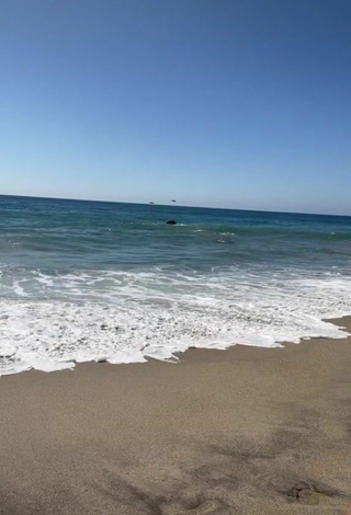 3. Pretty Maddy Belle Shows Cleavage in Bikini at the Beach