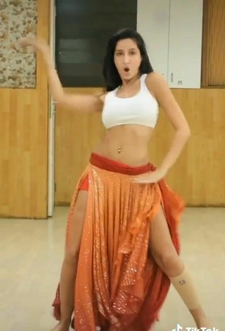 2. Sultry Nora Fatehi in White Crop Top