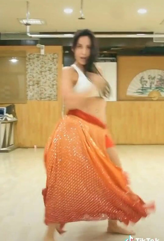 5. Sultry Nora Fatehi in White Crop Top