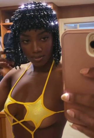 2. Sultry Iza in Yellow Swimsuit (Underboob)