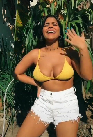 5. Dazzling Julia Antunes Shows Cleavage in Inviting Yellow Bikini Top