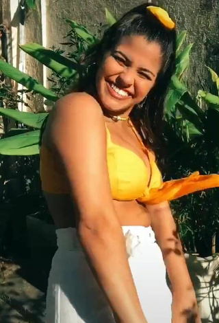 5. Julia Antunes Looks Sexy in Yellow Bikini Top