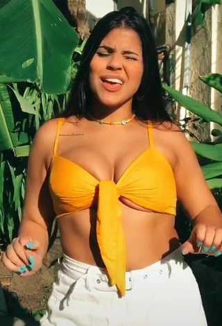 3. Magnificent Julia Antunes Shows Cleavage in Yellow Bikini Top