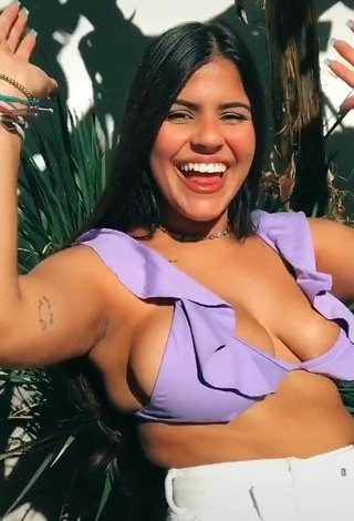 3. Julia Antunes Shows Cleavage in Cute Purple Bikini Top