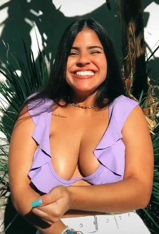 5. Julia Antunes Shows Cleavage in Cute Purple Bikini Top