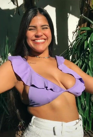 Alluring Julia Antunes Shows Cleavage in Erotic Purple Bikini Top