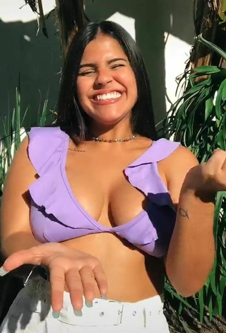 2. Alluring Julia Antunes Shows Cleavage in Erotic Purple Bikini Top