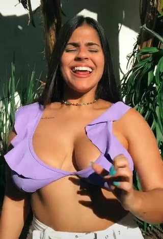 3. Alluring Julia Antunes Shows Cleavage in Erotic Purple Bikini Top