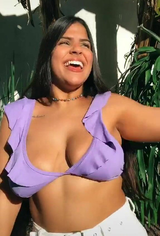 5. Alluring Julia Antunes Shows Cleavage in Erotic Purple Bikini Top